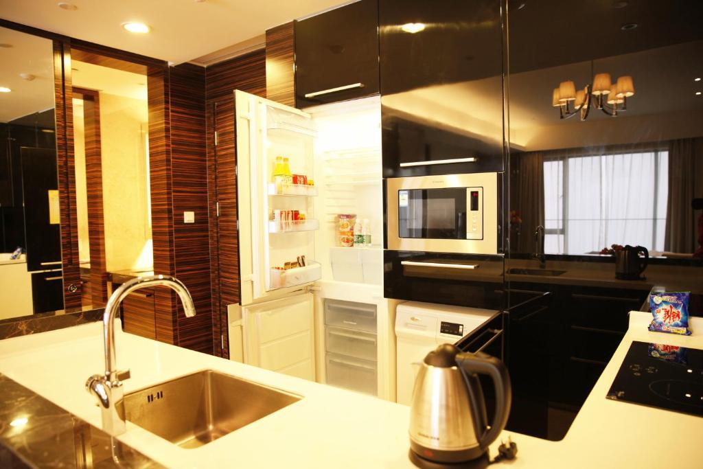 Checkinn International Apartment Kanton Zimmer foto