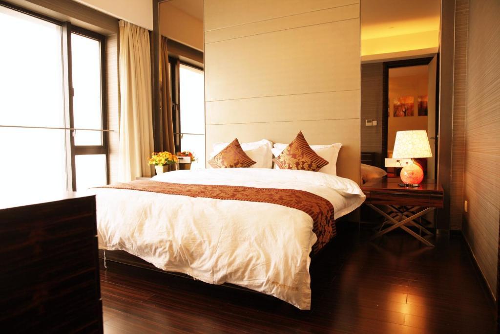 Checkinn International Apartment Kanton Zimmer foto