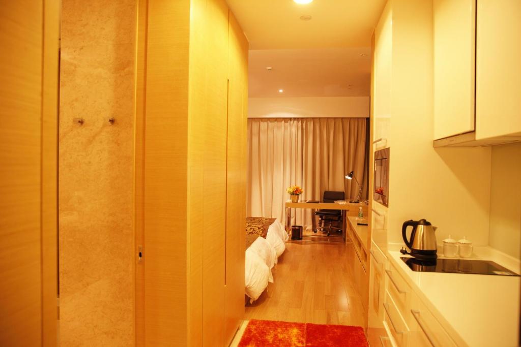Checkinn International Apartment Kanton Zimmer foto